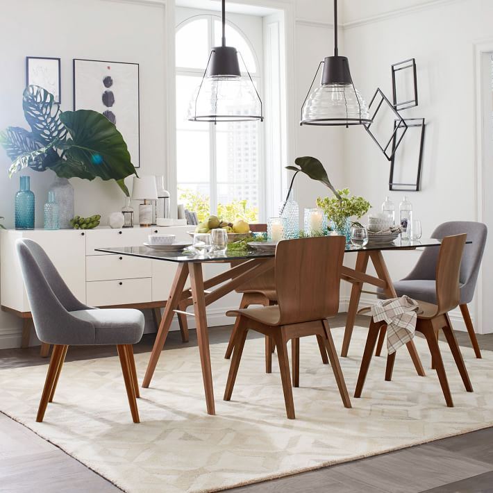 Eclectic dining room with tropical leaves