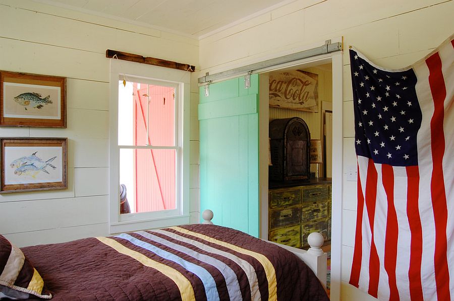 Elegant door adds color to the farmhouse bedroom [Photography: Corynne Pless]