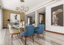 Exclusive-dining-area-with-brilliant-wall-art-and-custom-lighting-fixtures-217x155