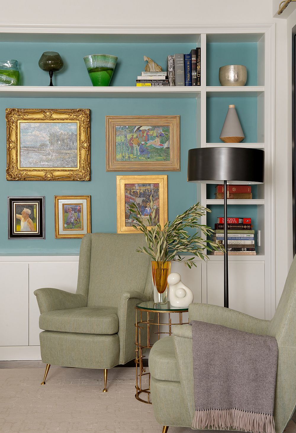 Gallery wall along with floating shelves creates a lovely display