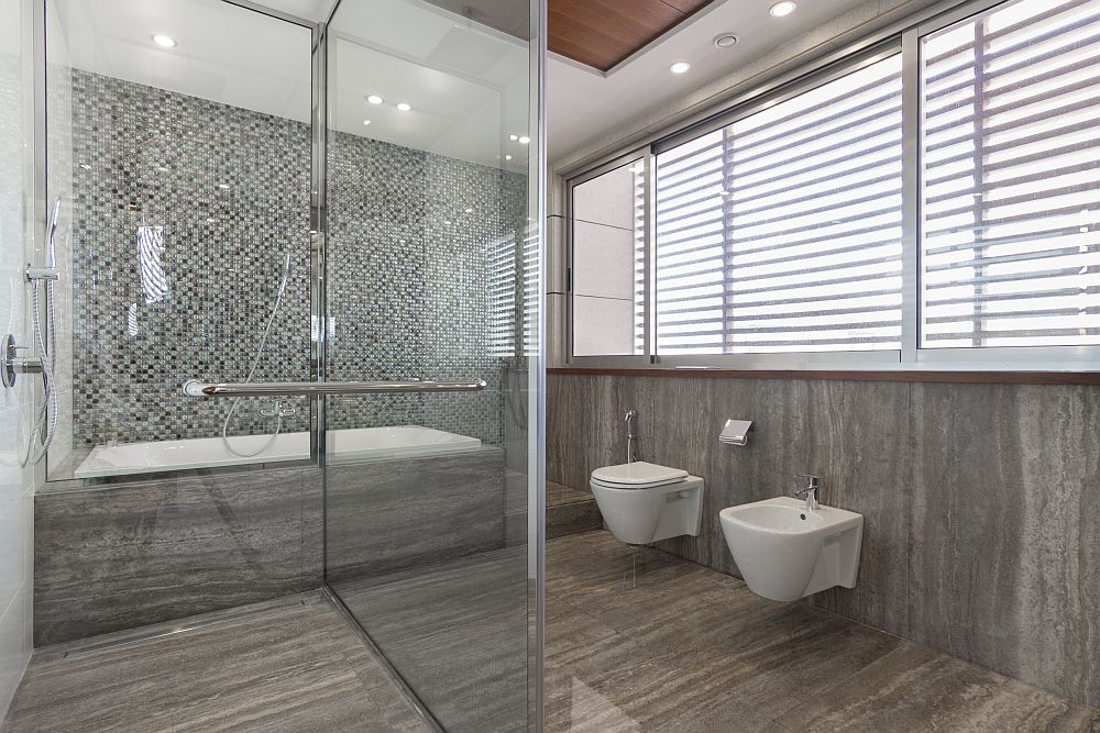 Glass shower area inside the modern bathroom