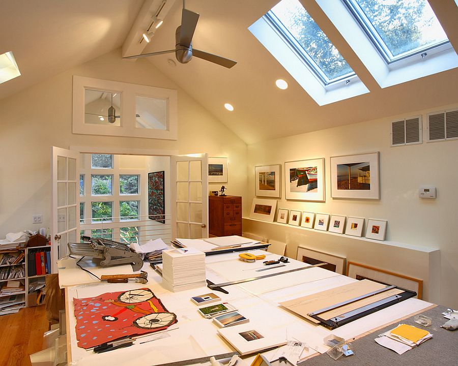 Home office with extra large work bench for artist and skylights