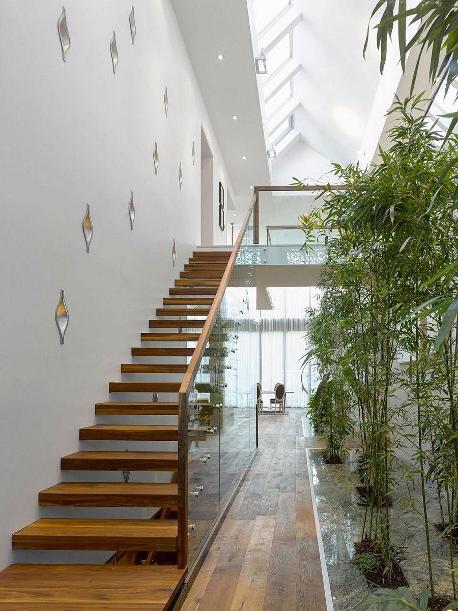 Interior bamboo garden and sculptural staircase of the brilliant Ontario home