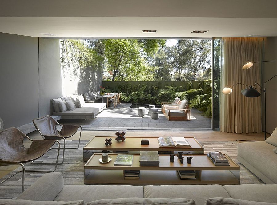 Large Glass Wall Overlooking Outdoor Oasis