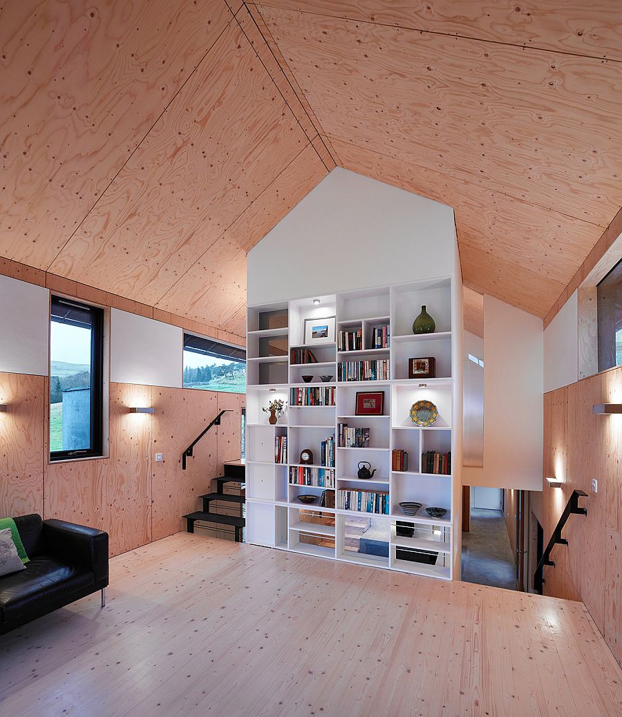 Large bookshelf in white adds contemporary touch to the home