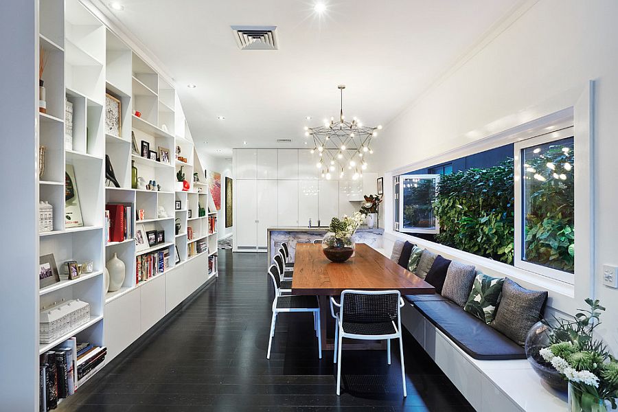 Large dining table window brings greenery indoors