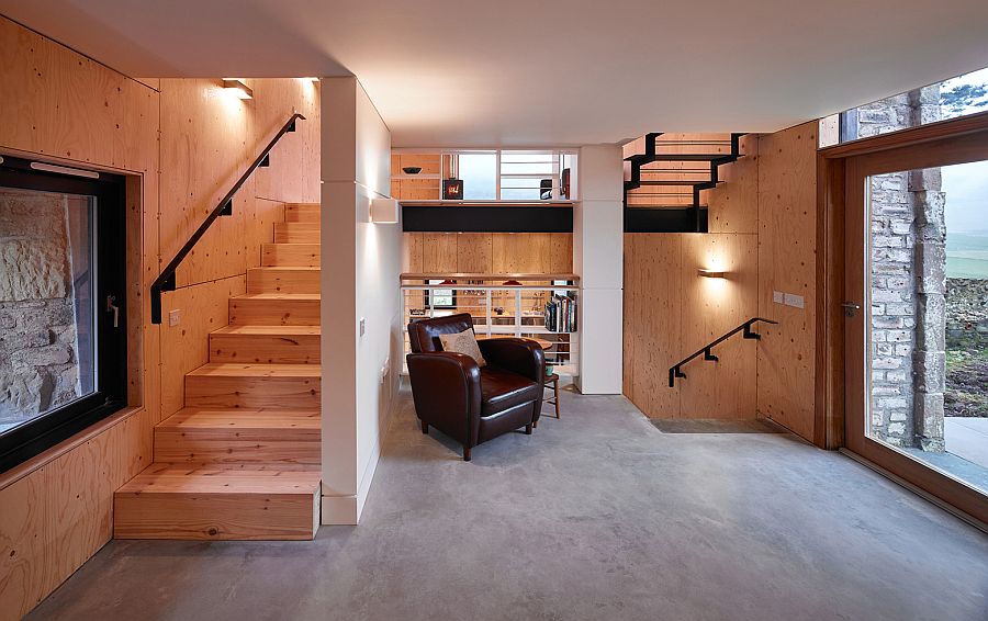 Living area of the renovated mill home with framed views