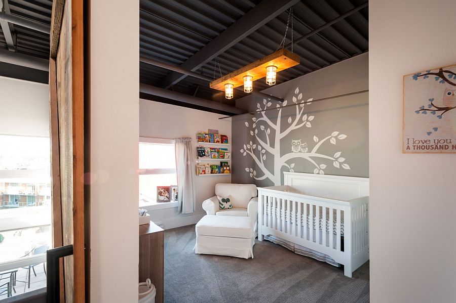 Lovely modern nursery design in gray with wall mural