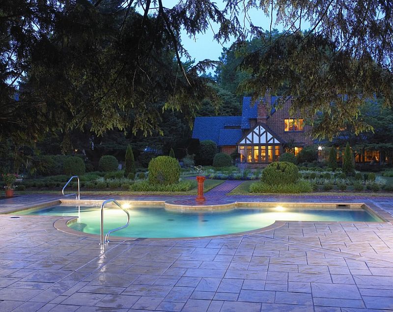 Lovely modified rectangular pool with a stamped concrete deck [Design: Douglas Aquatics]