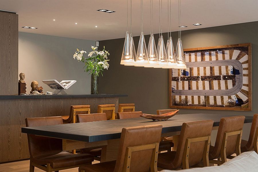 Lovely use of Fuchsia pendants above the dining table