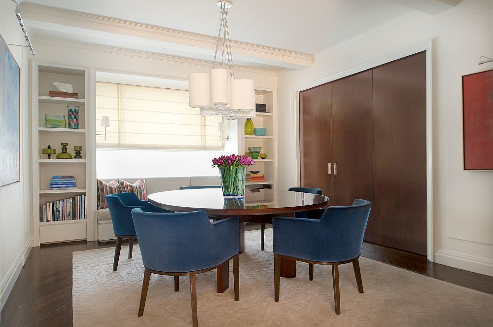 Mahogany sliding wall separates the kitchen and dining