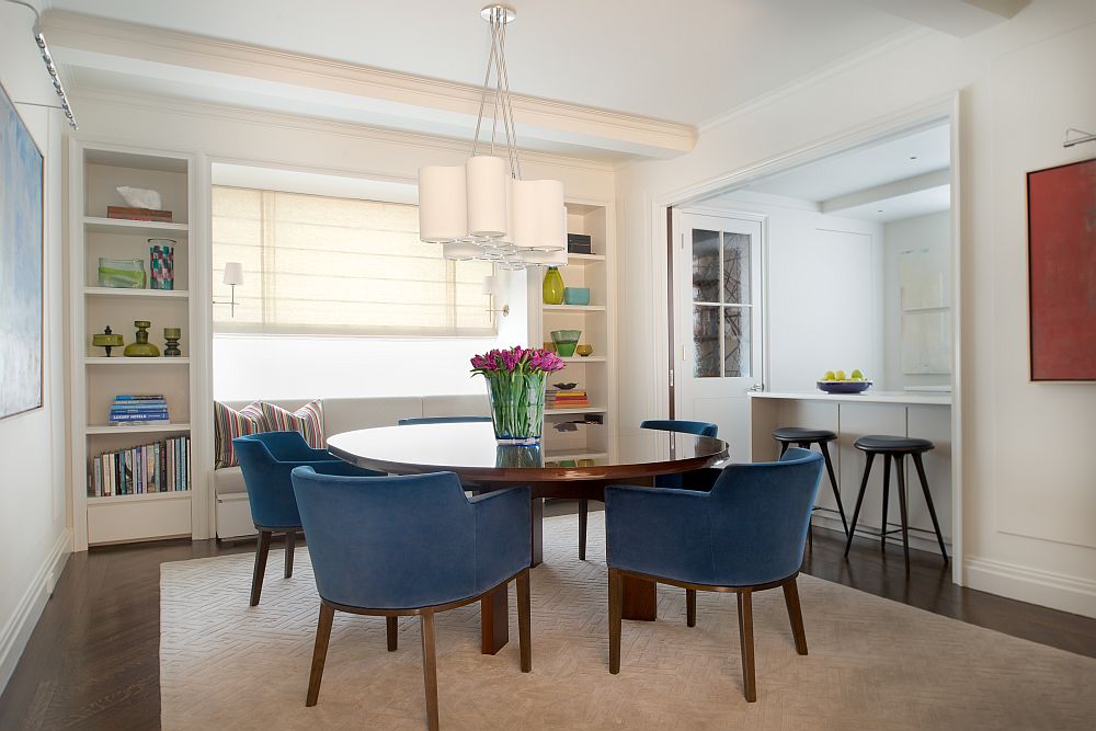 Mahogany sliding walls open up to reveal the kitchen