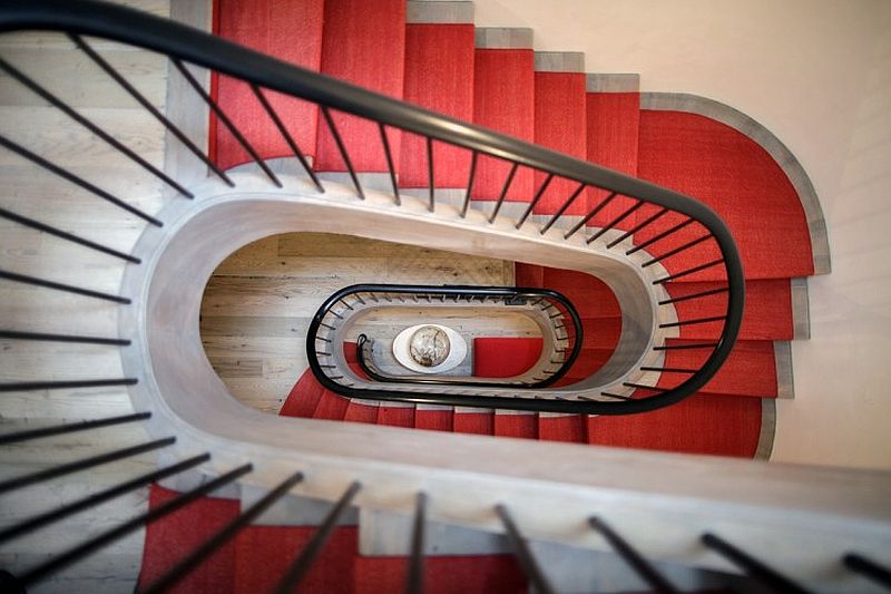 Master staircase lit up by grand skylight