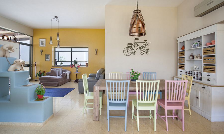 Mediterranean dining room with snazzy chairs in pastel hues [Design: Echo Design]