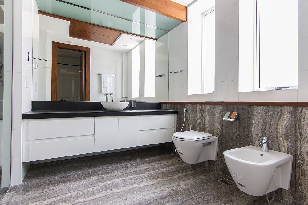 Minimal modern bathroom design with floating vanity in white