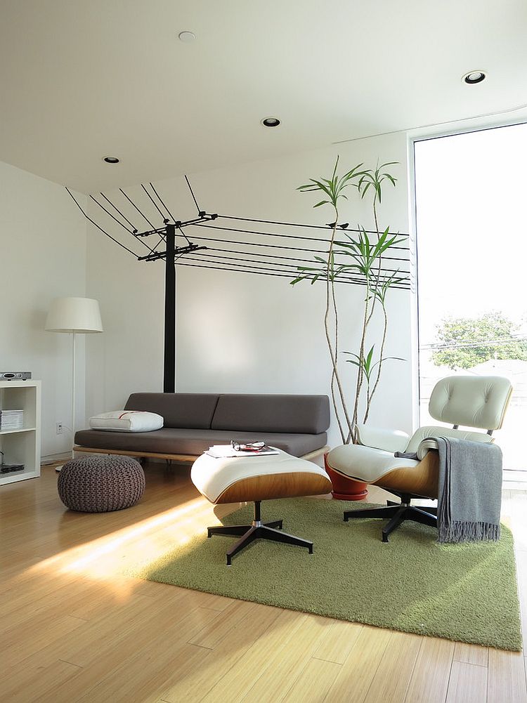 Modern family room with the Case Study Daybed and the Eames Lounger [Design: ras-a, inc.]