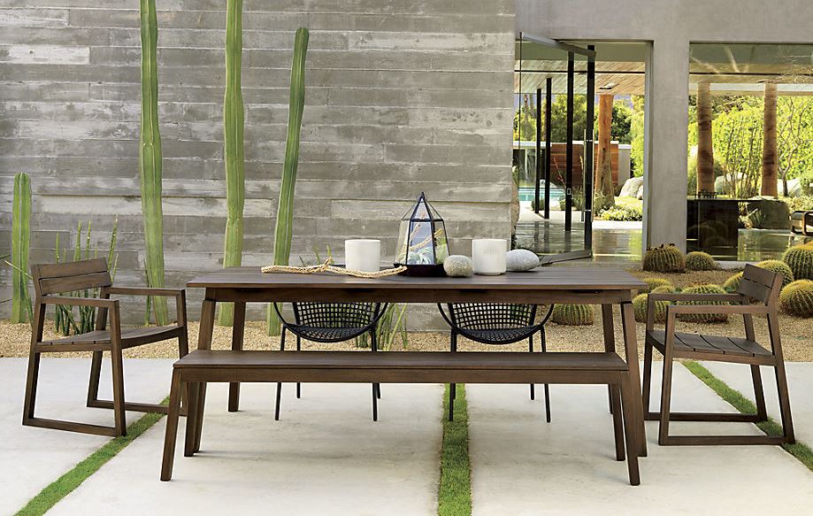 Modern outdoor dining space with cactus