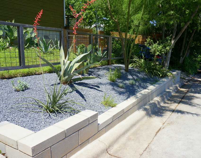 Using cinder blocks store for retaining wall