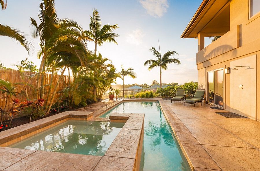 Pool deck gives the backyard a warm, cozy glow