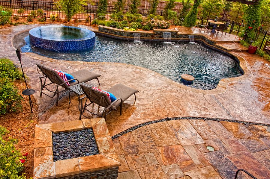 Pool deck in stamped concrete with slate skin pattern looks amazing