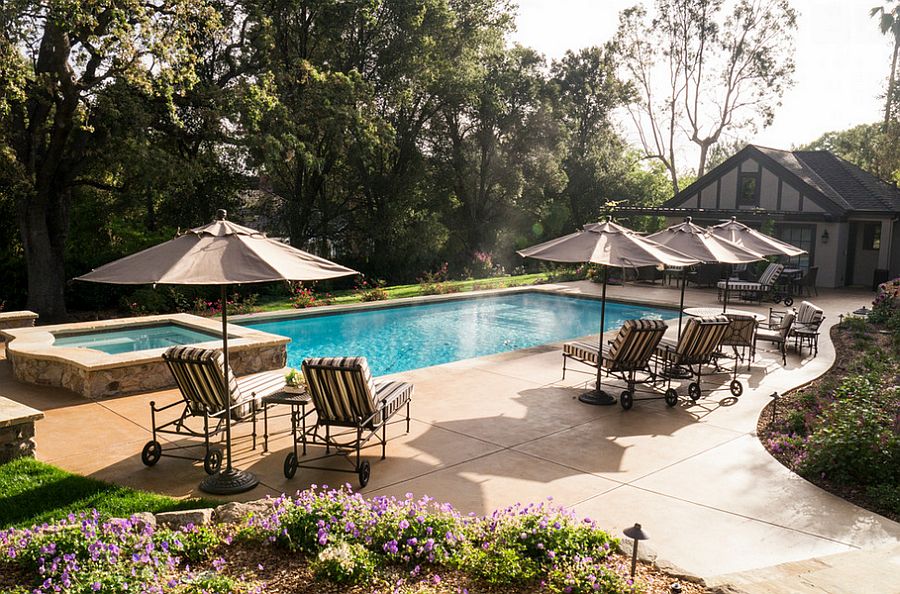 Relaxing pool area with colored and sand blasted concrete deck [Design: Design Focus International]