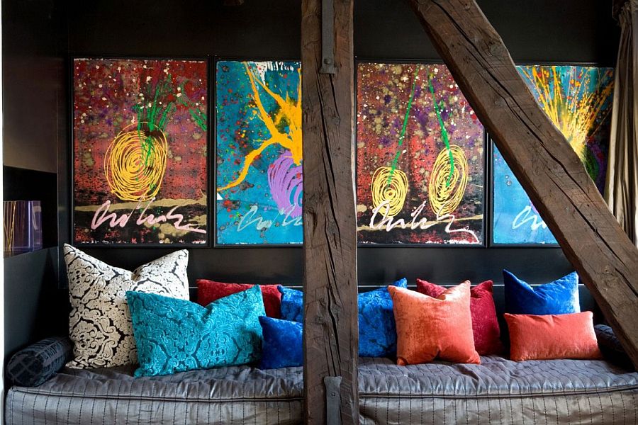 Sitting area with colorful throw pillows and equally captivating wall art