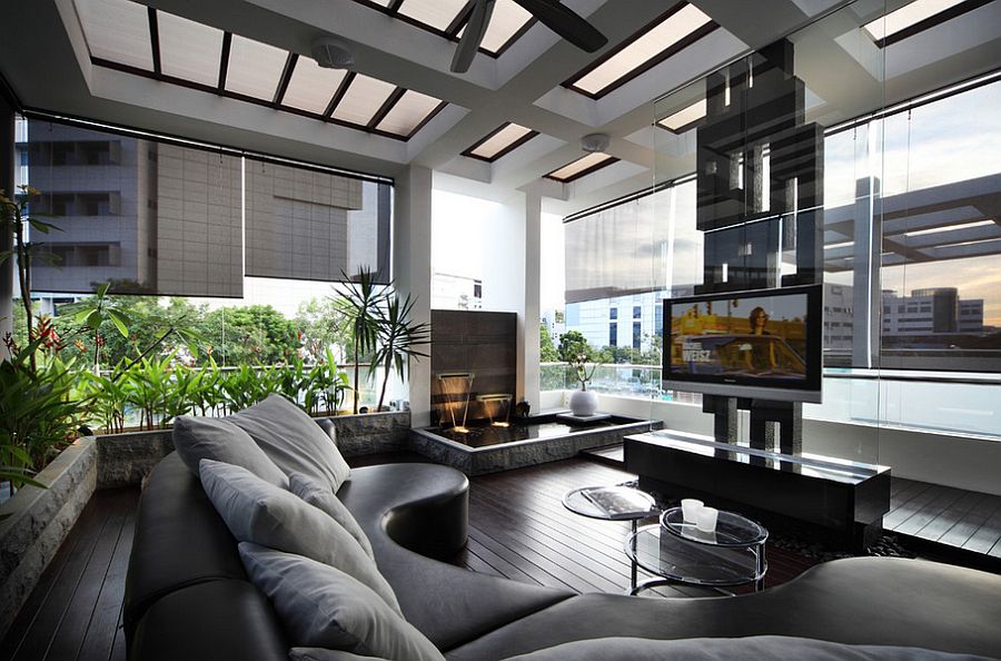 Sleek contemporary living room with a cool water feature [Design: The Interior Place (S) Pte Ltd]