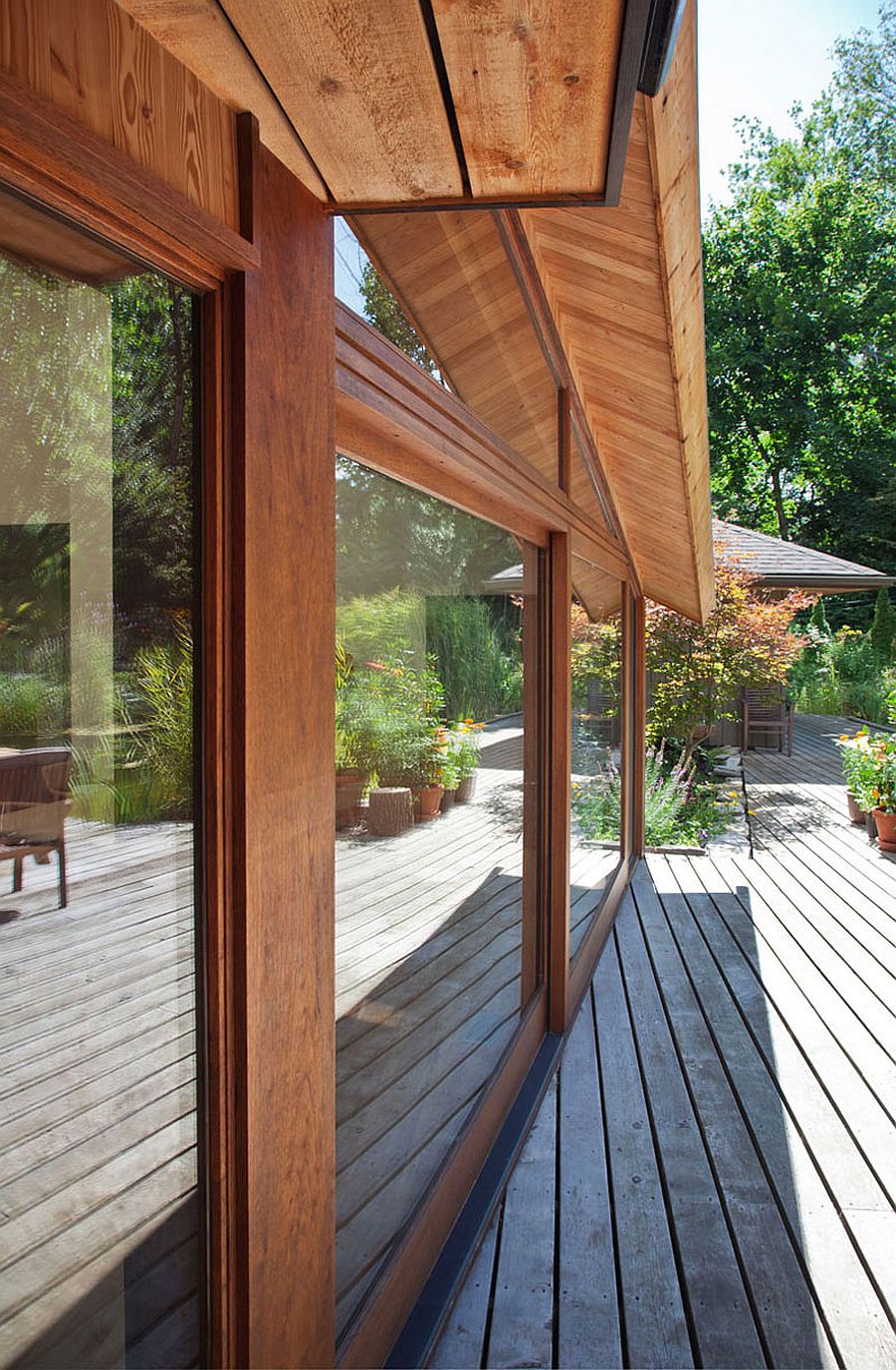 Sliding glass doors that connect the home with the deck outside