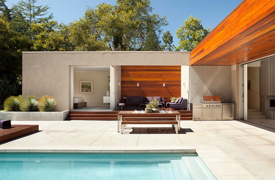 Slip-resistant concrete pool deck is perfect for wet environments [Design: Dumican Mosey Architects]