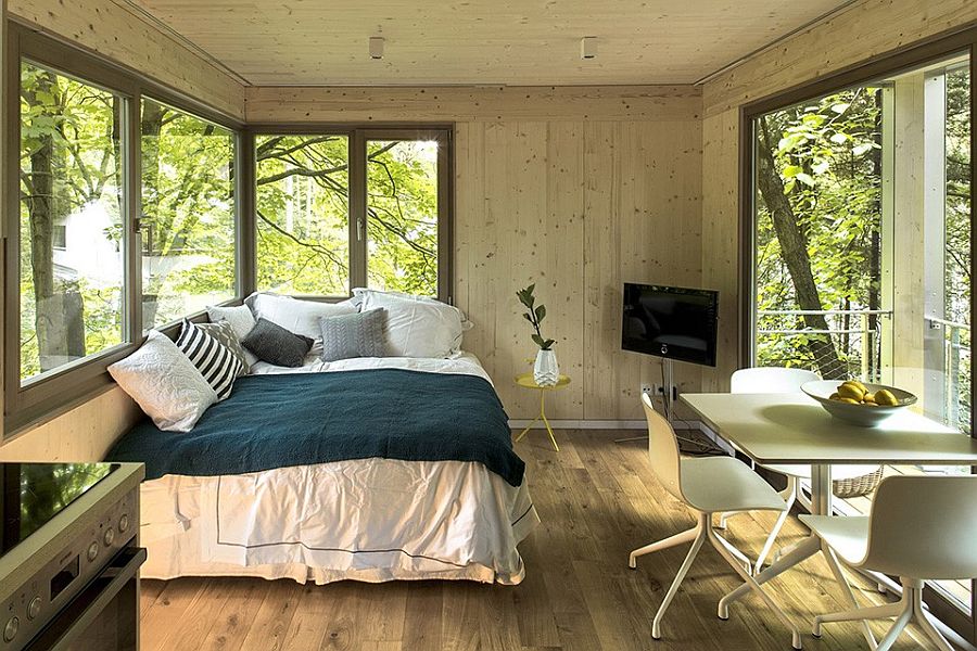 Small bedroom with a breakfast nook and private balcony