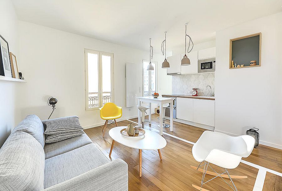 Small kitchen area in the corner with sleek workstation