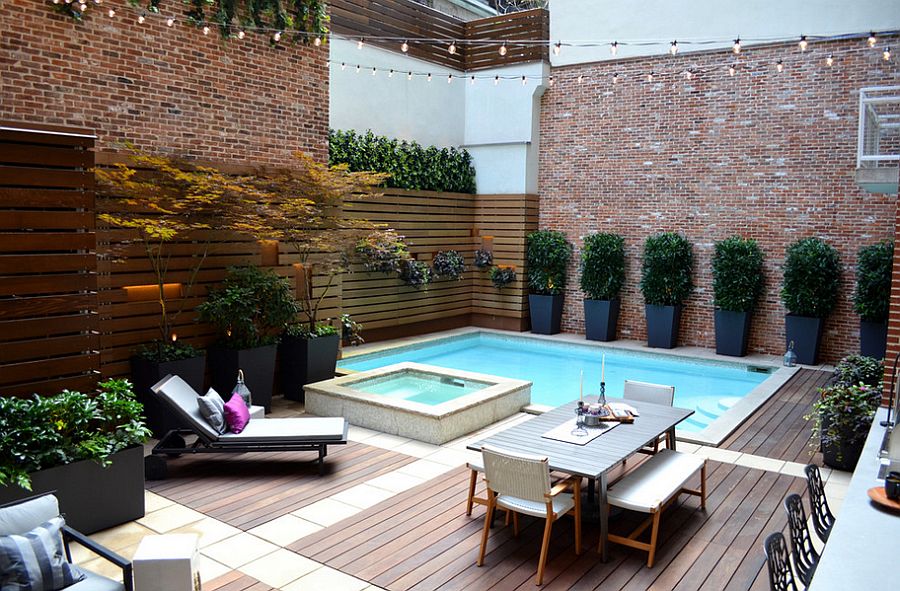 Small pool garden charms iwth its trendy, contemporary style