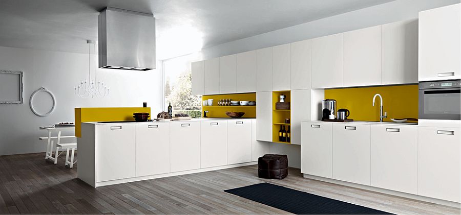 Splashes of yellow add liveliness to the contemporary kitchen