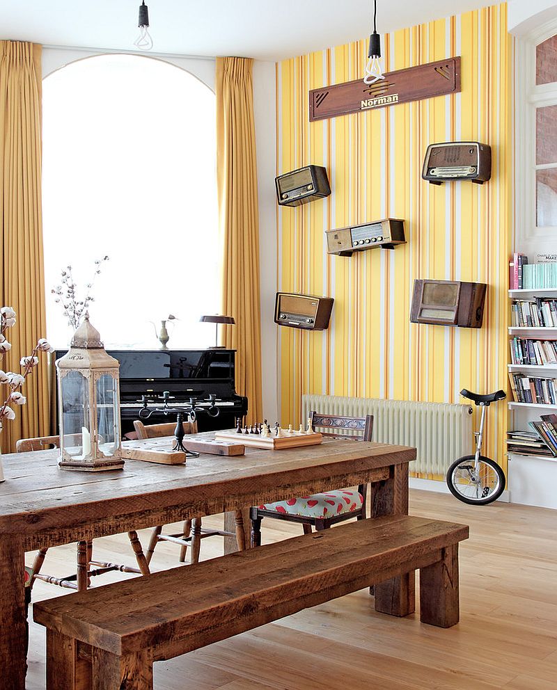 Striped yellow wallpaper in the modern dining room [Design: Avocado Sweets Interior Design Studio]