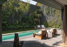 Stunning-pool-area-and-garden-landscape-shape-the-exterior-217x155