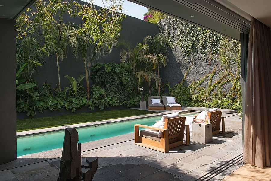 Stunning pool area and garden landscape shape the exterior