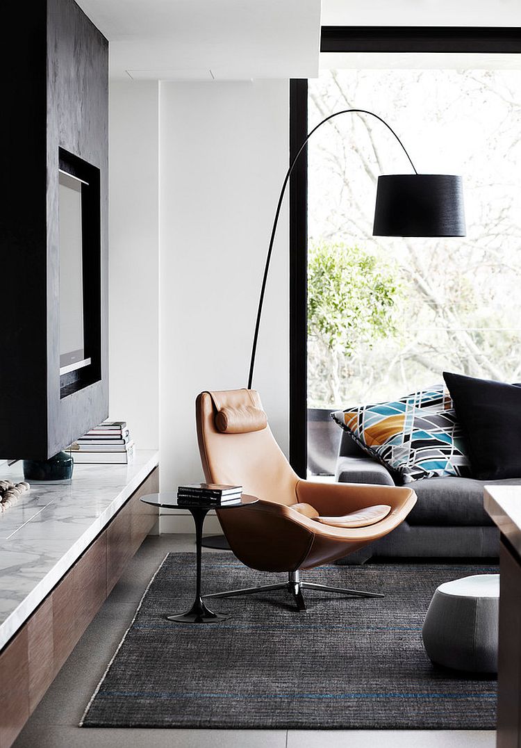 Trendy contemporary living room with a comfy reading corner [Design: Christopher Elliott Design]