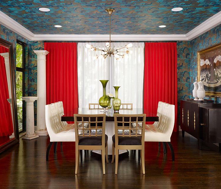 Trendy dining room draped in wallpaper