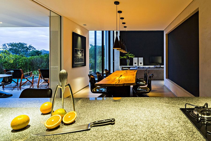 View of the lovely dining area in black and yellow from the kitchen