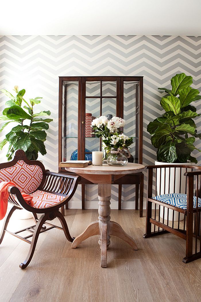 Wallpaper brings chevron style to the small, shabby chic dining space