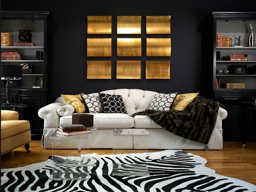 Zebra rug, black backdrop along with gold accents for the living room