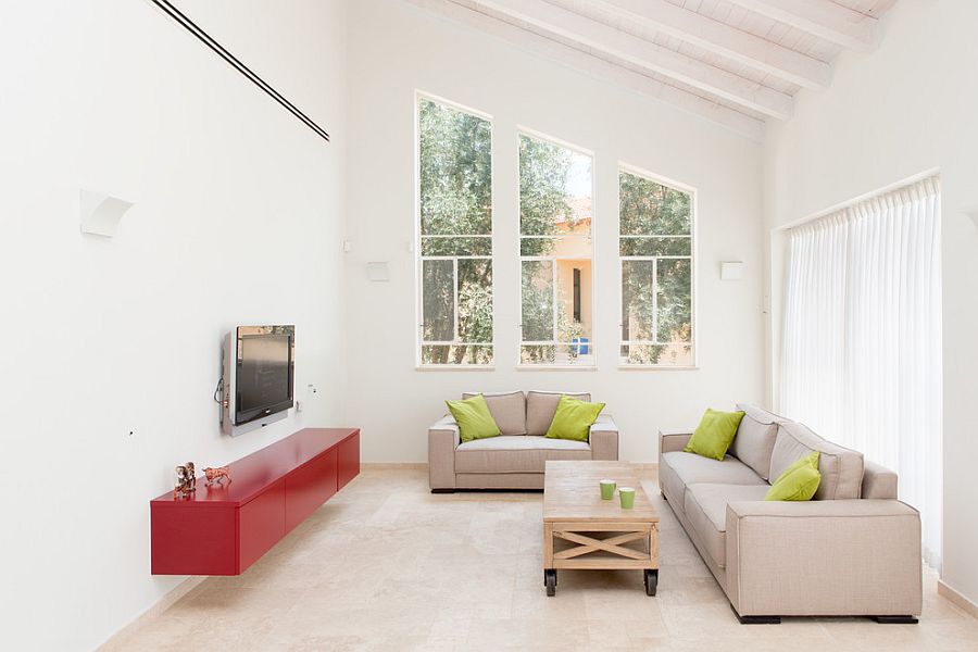 All-white living room with minimal decorating style [Design: Dana Shaked Interior Design Studio]
