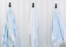 Beach-towels-on-pineapple-hooks-217x155