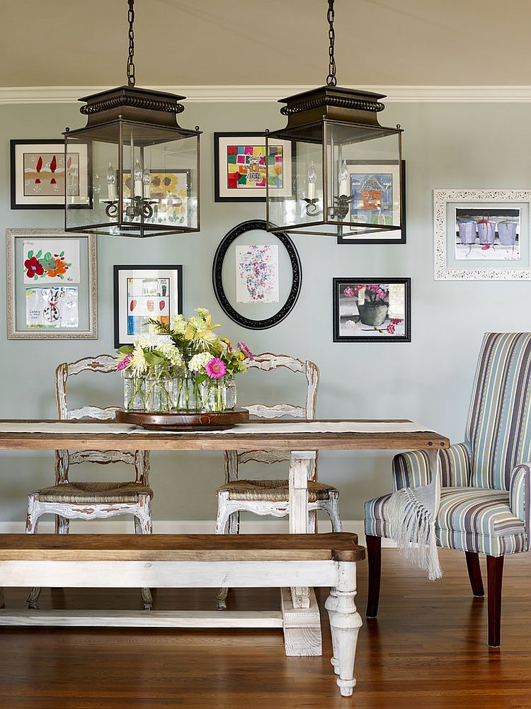 Beautiful gallery wall brings color to the relaxed dining room [Design: Verge Painting & Siding]