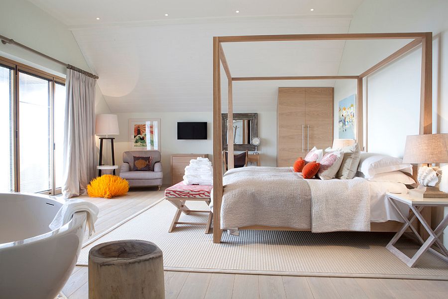 Beautiful master bedroom with a relaxed Scandinavian style and pops of color [Design: Cornish Interiors]