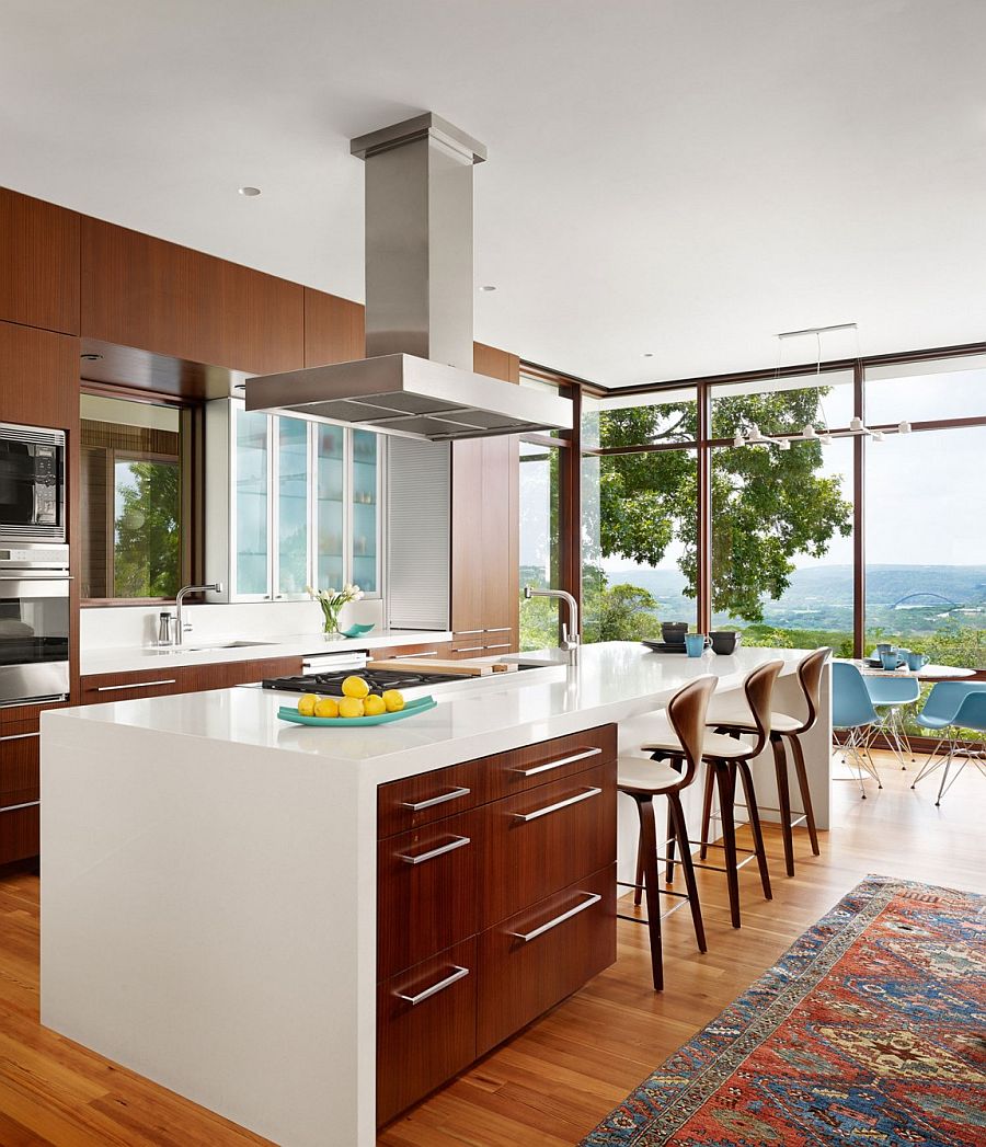 Beautiful modern kitchen of the Austin home with majestic views of the Bright Leaf preserve