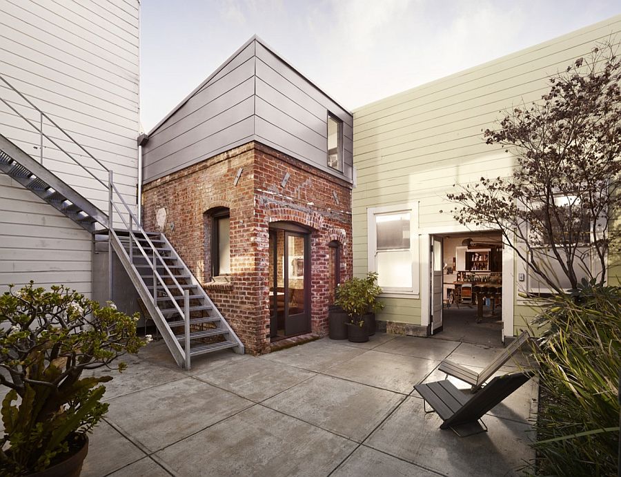 Brick exterior of the tiny boiler rool turned into a ultra-cool guest house