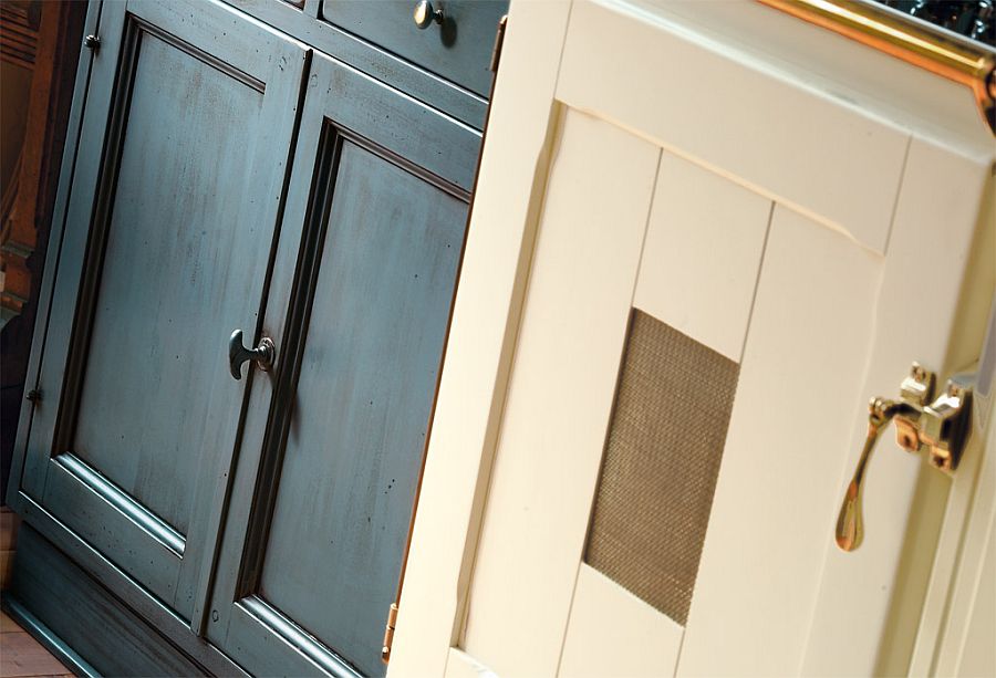 Cabinets painted in delicate pastel tones inside Doria kitchen