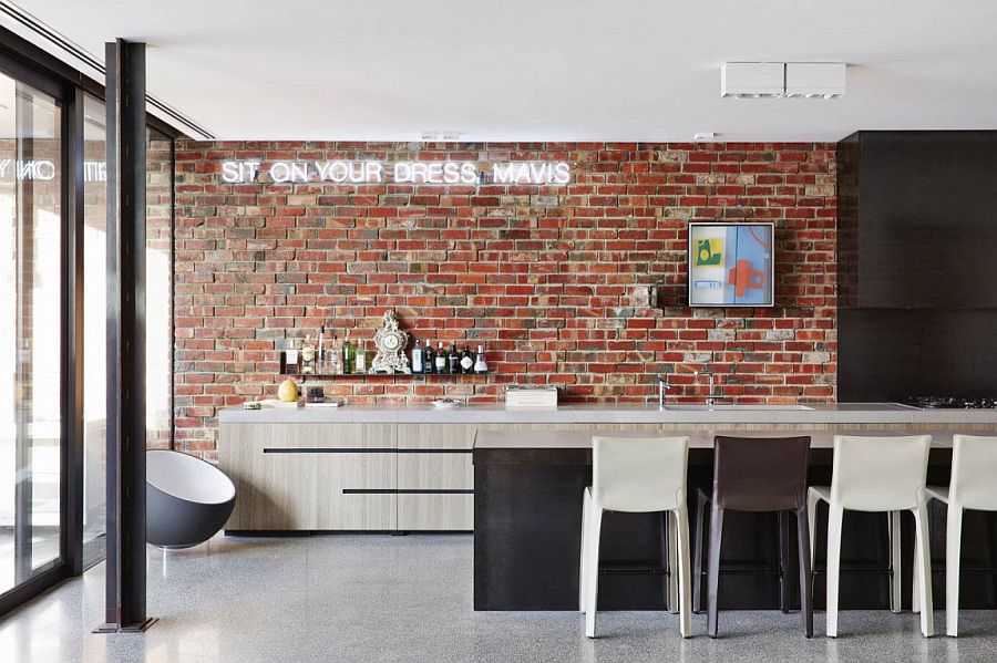 Contemporwray itchen with brick wall and illuminated sign