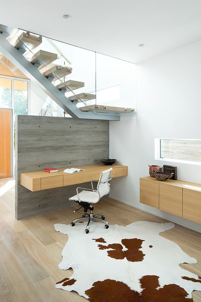 Cowhide rug brings a touch of authentic Scandinavian style to the chic home office [Design: KBCD Developments]